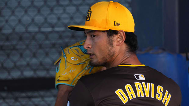 Yu Darvish throws a bullpen session wearing one of the new MLB uniform designs